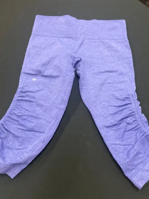 Lululemon Size 6 Cropped Purple Leggings